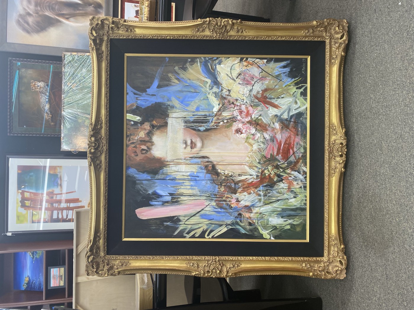 Framed fine-art portrait in a gilded frame at Marty & Pat's Fort Worth shop